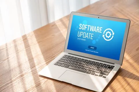 Software update on computer for modish version of device software Stock Photos