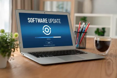 Software update on computer for modish version of device software Stock Photos