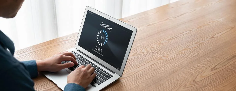 Software update on computer for modish version of device software 스톡 사진