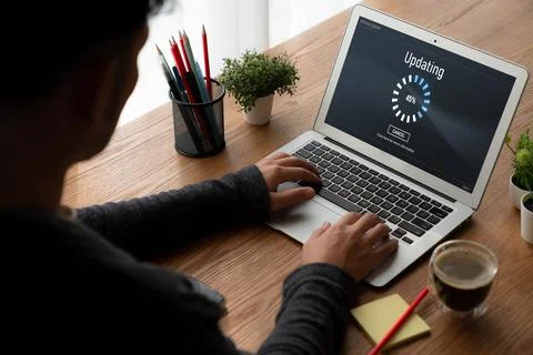 Software update on computer for modish version of device software Foto stock
