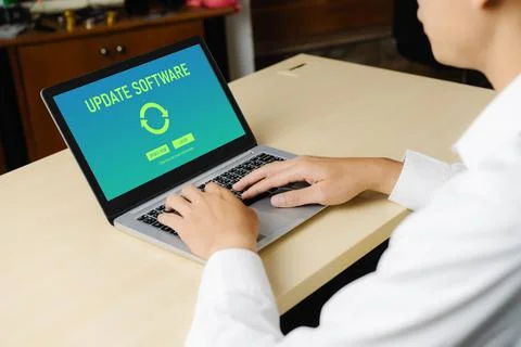 Software update on computer for modish version of device software Stock Photos