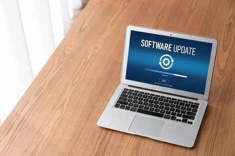 Software update on computer for modish version of device software Stock Photos