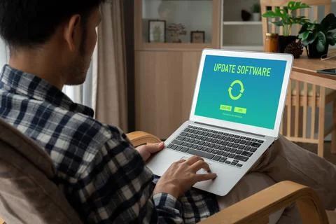 Software update on computer for modish version of device software Stock Photos