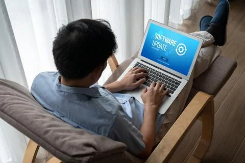 Software update on computer for modish version of device software Stock Photos