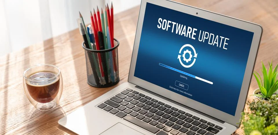 Software update on computer for modish version of device software Stock Photos