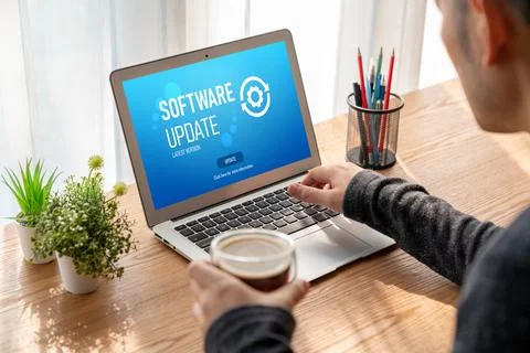 Software update on computer for modish version of device software Stock Photos