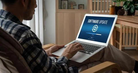 Software update on computer for modish version of device software Stock Photos
