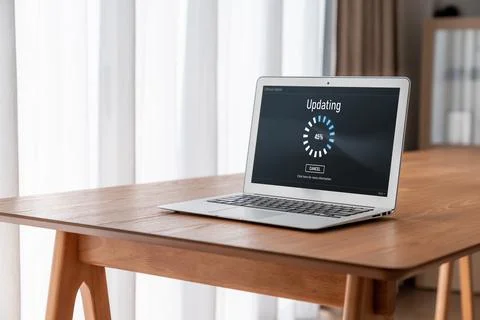 Software update on computer for modish version of device software Stock Photos