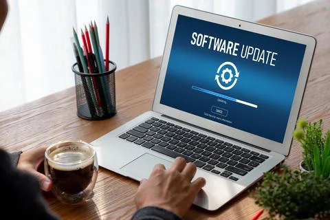 Software update on computer for modish version of device software 스톡 사진