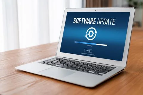 Software update on computer for modish version of device software Stock Photos