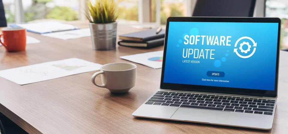 Software update on computer for modish version of device software Stock Photos