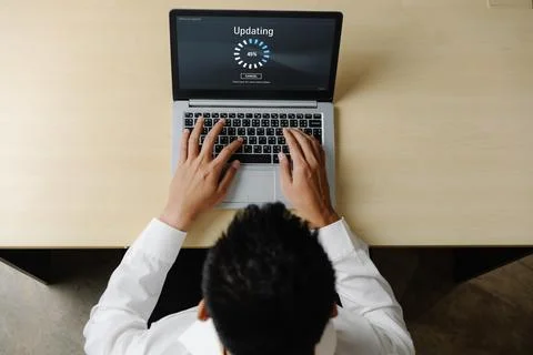 Software update on computer for modish version of device software Foto stock