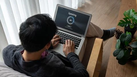 Software update on computer for modish version of device software Foto stock