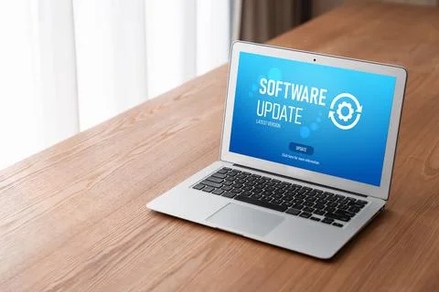 Software update on computer for modish version of device software Stock Photos