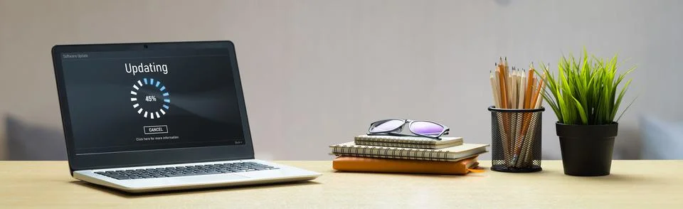 Software update on computer for modish version of device software Stock Photos