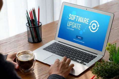 Software update on computer for modish version of device software Foto stock