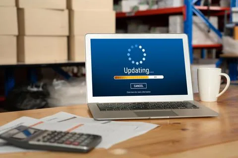 Software update on computer for modish version of device software Foto stock