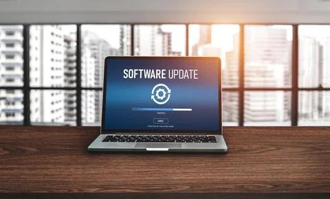 Software update on computer for modish version of device software Stock Photos