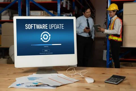 Software update on computer for modish version of device software Stock Photos
