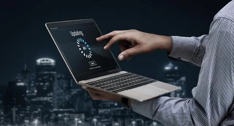 Software update on computer for modish version of device software Stock Photos