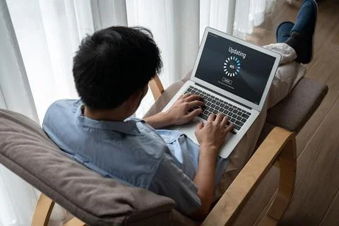 Software update on computer for modish version of device software Foto stock
