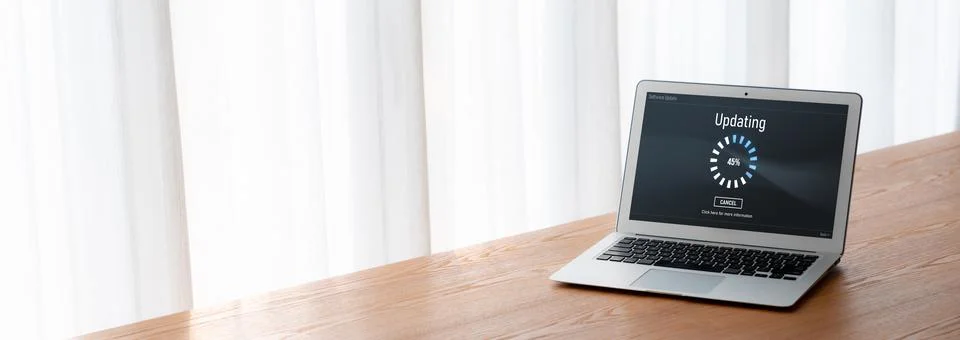 Software update on computer for modish version of device software Stock Photos
