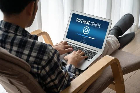 Software update on computer for modish version of device software Stock Photos