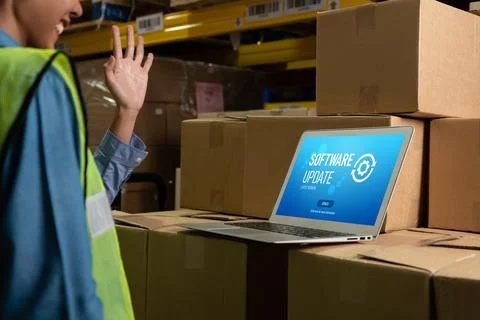 Software update on computer for modish version of device software Stock Photos