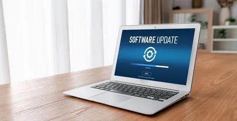 Software update on computer for modish version of device software Stockfoto's