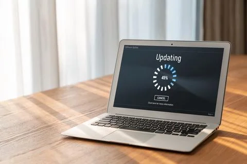Software update on computer for modish version of device software Foto stock