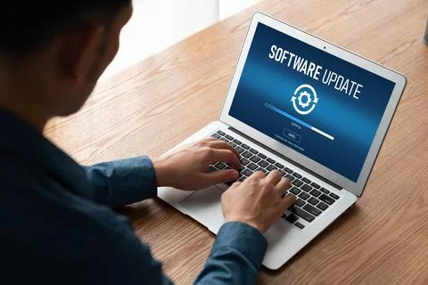 Software update on computer for modish version of device software Stock Photos