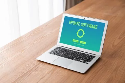 Software update on computer for modish version of device software Stock Photos