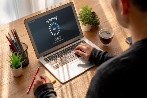Software update on computer for modish version of device software 스톡 사진