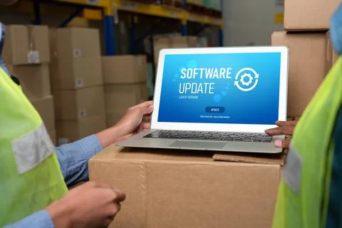 Software update on computer for modish version of device software Stock Photos