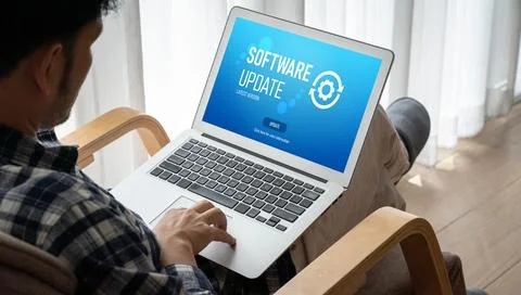 Software update on computer for modish version of device software Stock Photos