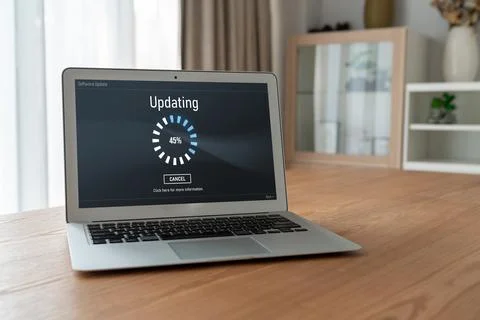 Software update on computer for modish version of device software Stockfoto's