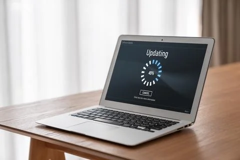 Software update on computer for modish version of device software 스톡 사진