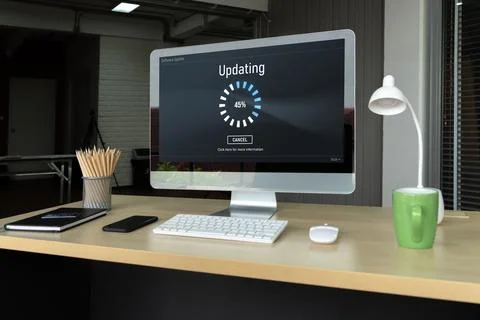 Software update on computer for modish version of device software Stock Photos