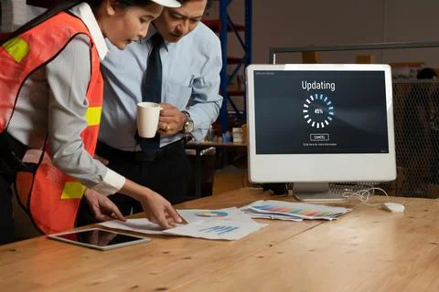 Software update on computer for modish version of device software Stock Photos