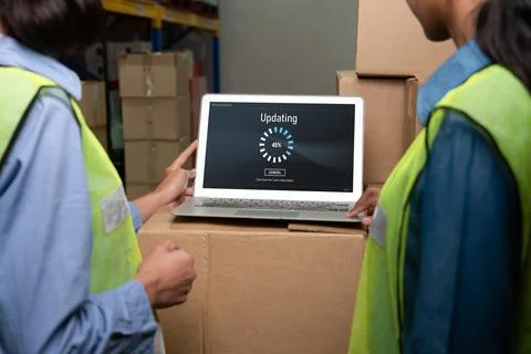 Software update on computer for modish version of device software Stock Photos