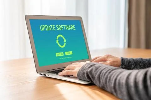 Software update on computer for modish version of device software Stock Photos