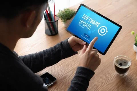 Software update on computer for modish version of device software Stock Photos