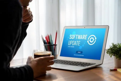Software update on computer for modish version of device software 스톡 사진