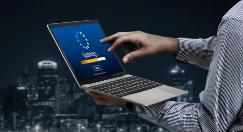 Software update on computer for modish version of device software 스톡 사진