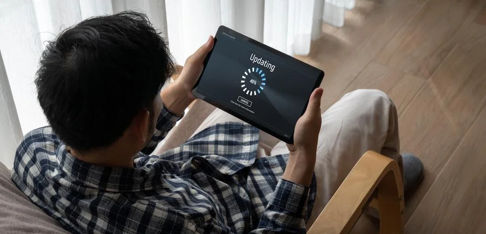 Software update on computer for modish version of device software Stock Photos