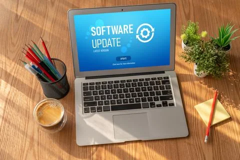 Software update on computer for modish version of device software Stock Photos