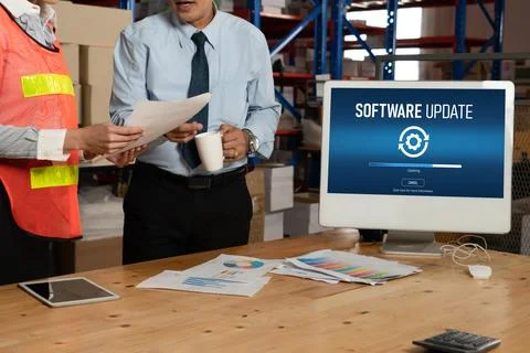 Software update on computer for modish version of device software Stock Photos