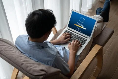 Software update on computer for modish version of device software Stock Photos