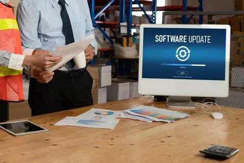 Software update on computer for modish version of device software Foto stock