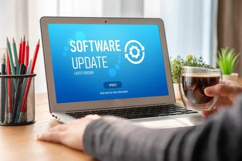 Software update on computer for modish version of device software Stock Photos